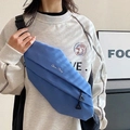 Blue canvas crossbody chest bag with adjustable strap and layered design for commute - Blue