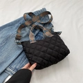 Black quilted nylon tote bag with colorful geometric handles and wide shoulder strap - Black