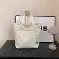 Minimalist creamy white canvas tote bag with functional front zipper pocket for women - White
