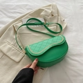 Bright green saddle bag featuring diamond quilted pattern and gold chain trim detail - Green