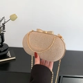 Pochette da sera ovale con paillettes champagne e chiusura a fiocco in metallo - Oro