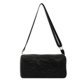 Minimalist large capacity black cylinder shoulder bag with textured surface and gold rings - Black