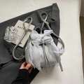 Chic silver gray women's backpack featuring an elegant oversized white lace bow detail - Silver