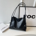 Large black minimalist soft leather tote bag with stylish drawstring details and long straps - Black