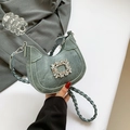 Green crescent shoulder bag with square rhinestone buckle and woven strap detail - Green