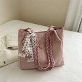 Pink textured tote bag with woven straps and decorative silk scarf accessory - Pink