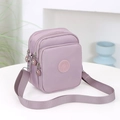 Bolso bandolera vertical de nailon lavanda con múltiples bolsillos para mujeres - Púrpura