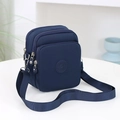 Bolso bandolera minimalista de nailon azul marino con tres compartimentos de cremallera - Azul marino