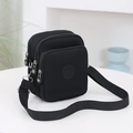 Bolso bandolera clásico de nailon negro con múltiples compartimentos y correa ajustable - Negro