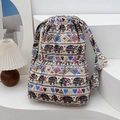 Detail of ethnic striped drawstring backpack featuring blue and red elephant print - Colorful Elephant Print Ethnic Style (Style 1)