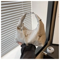 Detail of silver marble PU leather handbag with metallic butterfly charms and top handle - Silver