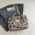 Borsa tote in tela con ricamo a farfalla e logo JINGPINN8 in bianco crema - Bianco
