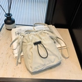 Minimalist beige nylon drawstring crossbody bag with pleated texture and adjustable cord - 19.5*15.5*5cm / White