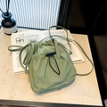 Grass green nylon drawstring bucket bag with black spring buckle and adjustable strap - 19.5*15.5*5cm / Green