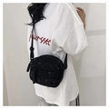 Detail of strawberry print corduroy crossbody bag with adjustable strap and charm - 21x18x8cm / Black