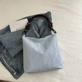 Light blue pleated tote bag with dark brown circular wooden bead handles for women - Blue