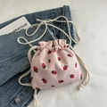 Sac seau en velours côtelé rose avec imprimé fraises et fermeture par cordon - Rose