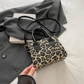 Stylish leopard print corduroy crossbody bag with black handles and gold hardware - Leopard Print / Khaki