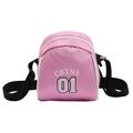 Pink canvas crossbody shell bag with white CHINA and 01 print and black strap - Pink