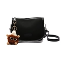 Black nylon saddle bag with a cute plush monster charm and top zipper closure - Bag / Black