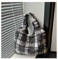 Detail of frayed texture and grey plaid pattern on the casual tote bag surface - Black Grid
