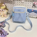 Light blue and white fashion crossbody bag with clear PVC display pocket - Blue