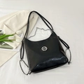 Chique zwarte tote tas van oliewasleder met zilveren M-logo en ketting schouderriem - Zwart