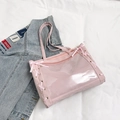 Pink ribbon tote bag with clear PVC window and stylish bow detail in a flat lay view - Pink