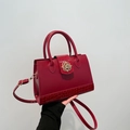 Red crocodile texture tote bag with golden floral lock and adjustable shoulder strap - Red