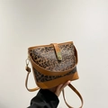 Leopard print bucket bag with camel leather trim and gold buckle closure - Brown