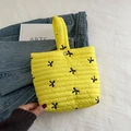 Borsa trapuntata gialla con ricami a fiocco neri e chiusura con bottone magnetico - Giallo