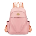 Pink nylon waterproof backpack for college students featuring a high-capacity design - Pink