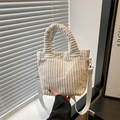 Piccola borsa a secchiello in velluto a coste bianco con manico cilindrico e tracolla - Bianco