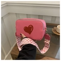 Pink lychee leather crossbody camera bag with red heart and geometric wide strap - Pink