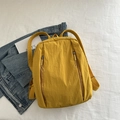 Ginger yellow nylon backpack with natural crinkle texture and large capacity for commuting - Yellow