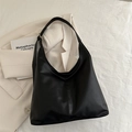 Minimalist black matte hobo tote bag with adjustable shoulder strap for winter 2025 - Black