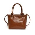 Brown glossy bucket bag with knotted handles and fine shoulder strap in vintage style - Brown