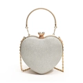 Silberne Glitzer-Abendtasche in Herzform mit goldenem Rundgriff und Kettenriemen - Silber