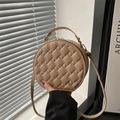 Chic beige round crossbody bag with woven grid texture and golden zipper detail - Khaki