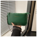 Close-up of dark green pebble leather envelope bag featuring a gold fashion logo and silver chain - Green