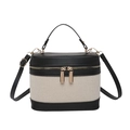 Moderne bucket bag met kleurblokken van zwart leer en crème geweven textuur - Zwart