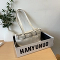 Chic off-white faux leather shoulder bag with decorative buckles and slim double straps - Off White