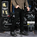 Detail of Kevlar protective lining and CE certified knee pads on black biker jeans - Black