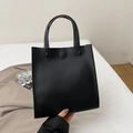Sac fourre-tout noir minimaliste en similicuir mat avec deux poignées pour le quotidien - Noir