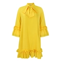 Dettaglio di un abito giallo brillante con grande fiocco al collo e orli a balze - S / Giallo
