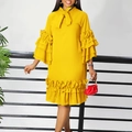 Detailed shot of yellow tiered ruffle sleeves and elegant bow neckline on a summer dress - Yellow