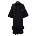 Detail view of the black midi dress featuring layered ruffle sleeves and a bow neckline - S / Black
