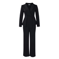 Detail of elegant black peplum top and trousers set with shawl collar and buttoned cuffs - S / Black
