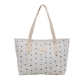 Borsa tote bianca con stampe di fiocchi neri e tracolla in pelle beige di qualità - Bianco