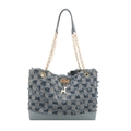 Denim tote bag with checkered pattern, frayed edges, and golden deer charm on white background - Checkered Blue